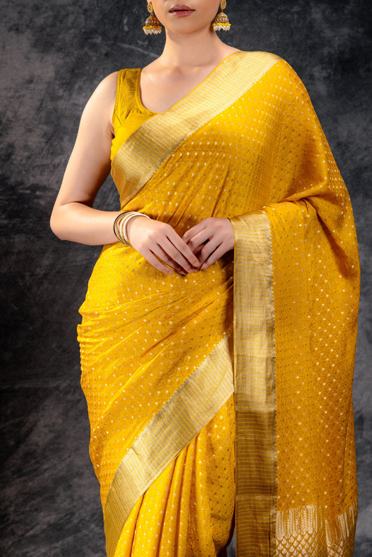 Mustard Yellow Crepe Saree with Silver Zari Buttas and Floral Jaal Texture
