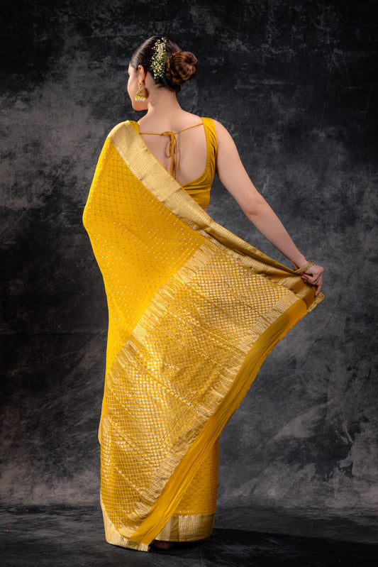 Mustard Yellow Crepe Saree with Silver Zari Buttas and Floral Jaal Texture