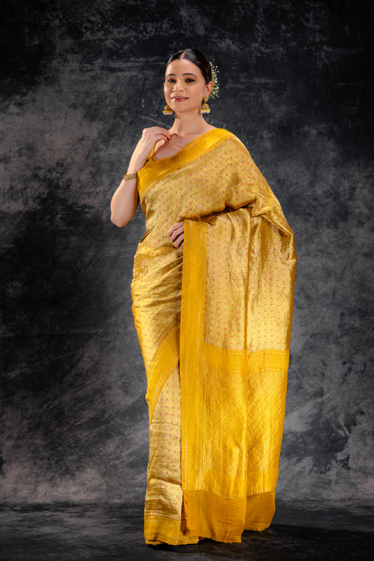 Mustard Crepe Silk Saree with Rani Meena Buttas and Diagonal Zari Weave