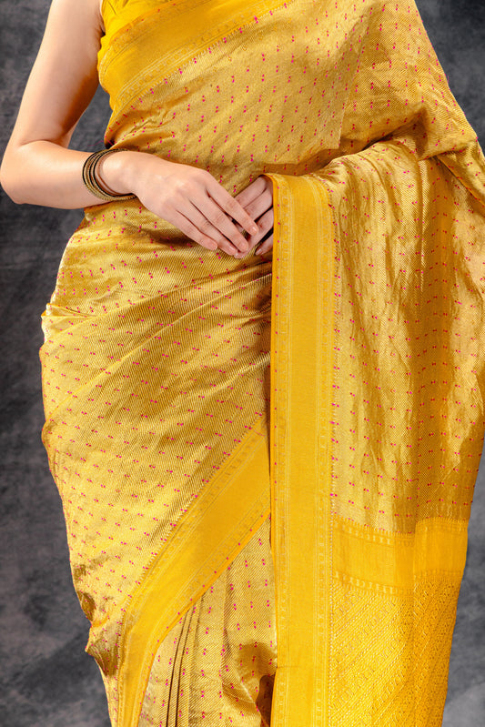 Mustard Crepe Silk Saree with Rani Meena Buttas and Diagonal Zari Weave