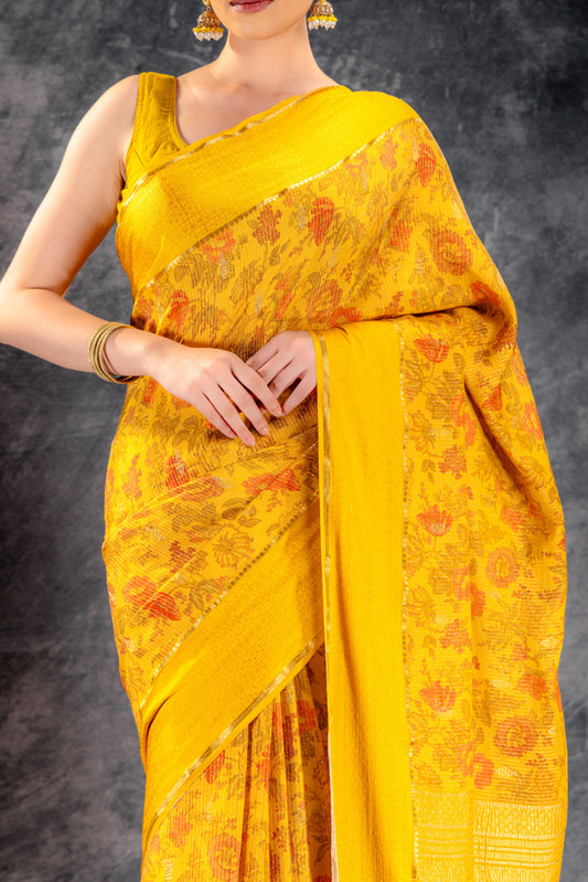 Brust Yellow Crepe Saree with Floral Print and Embossed Border