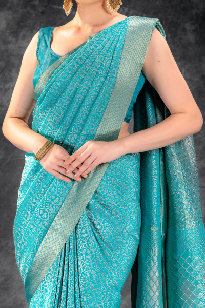 Sea Teal Zari Crepe Brocade Saree with Intricate Zari Floral Weave