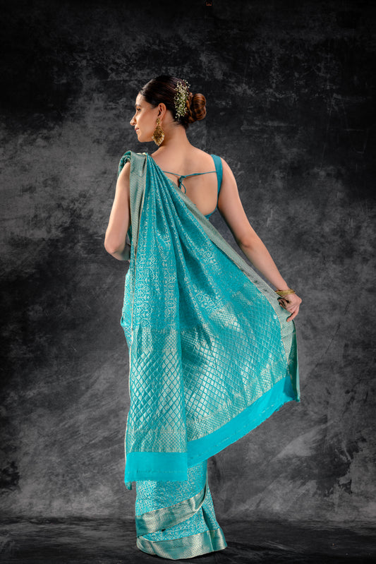 Sea Teal Zari Crepe Brocade Saree with Intricate Zari Floral Weave