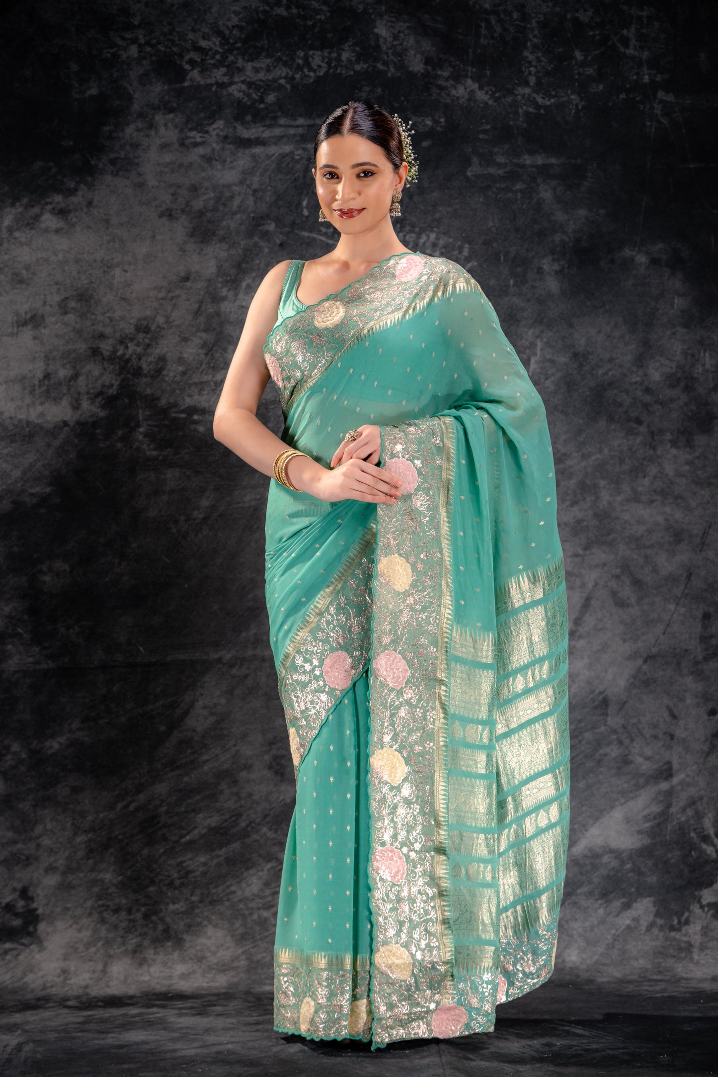 Meadow Green Georgette Saree with Zari Buttas and Embroidered Border