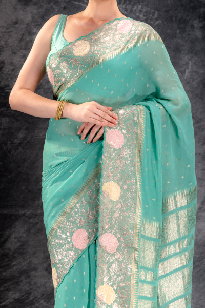 Meadow Green Georgette Saree with Zari Buttas and Embroidered Border