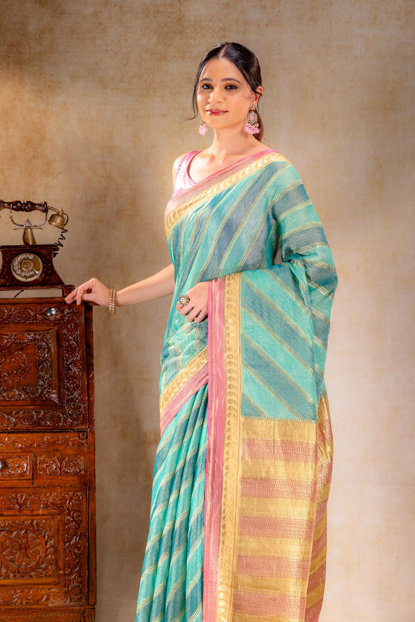 Teal Green Tissue Saree with Mango Motif and Contrasting Zari Lines