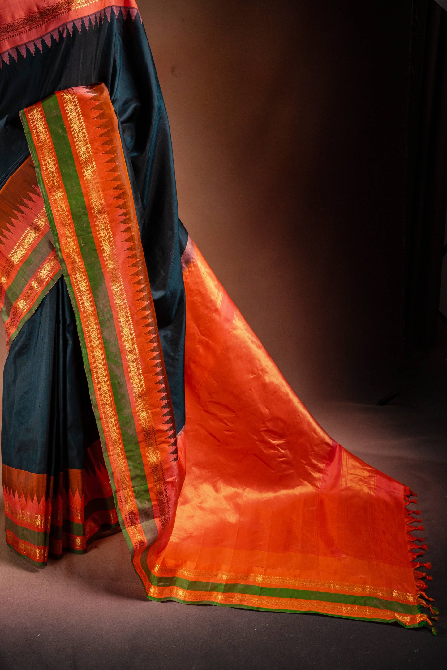 Gadwal Silk Black with Orange Border Saree