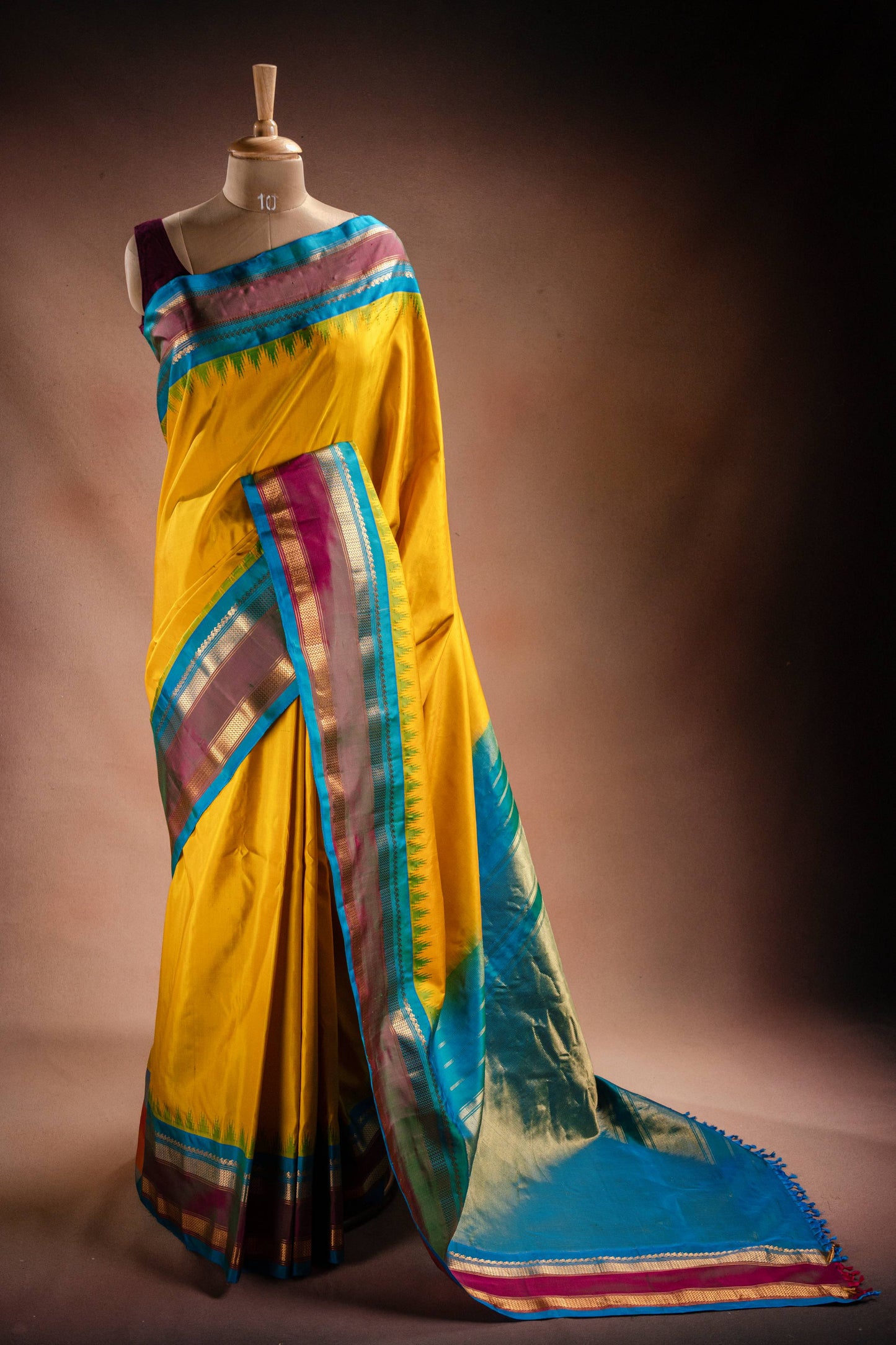 Gadwal Silk Yellow with Blue Border Saree