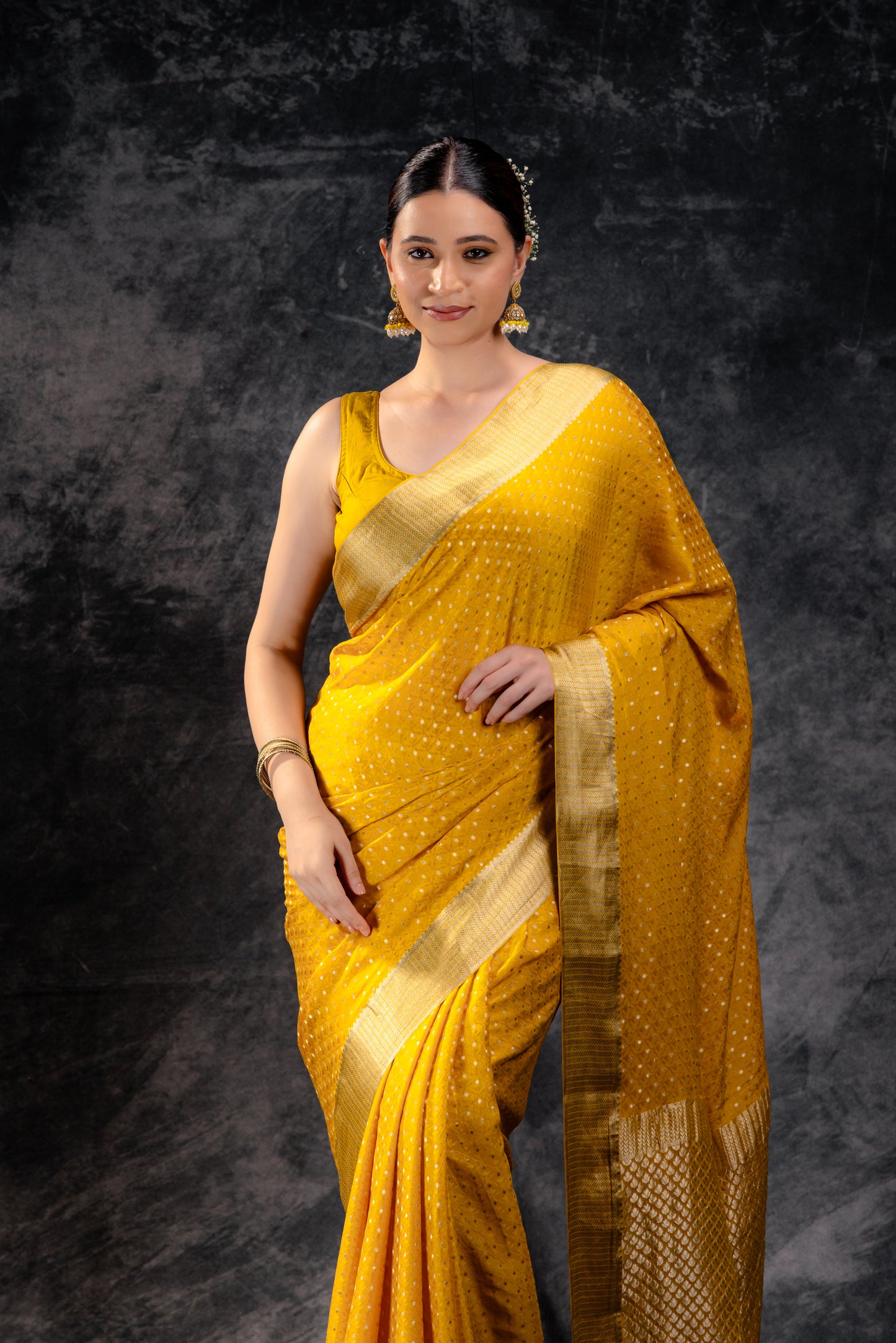 Mustard Yellow Crepe Saree with Silver Zari Buttas and Floral Jaal Texture