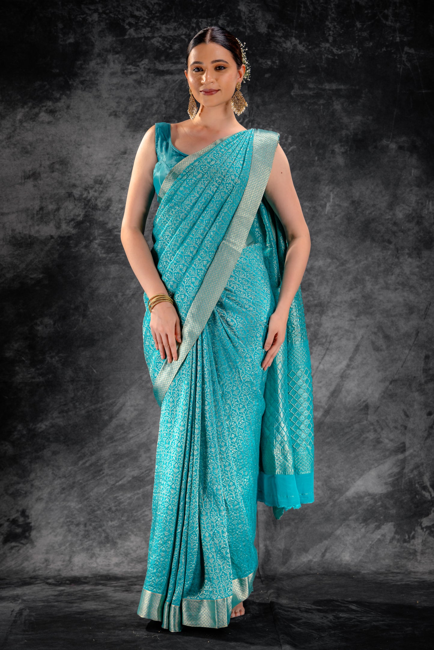 Sea Teal Zari Crepe Brocade Saree with Intricate Zari Floral Weave
