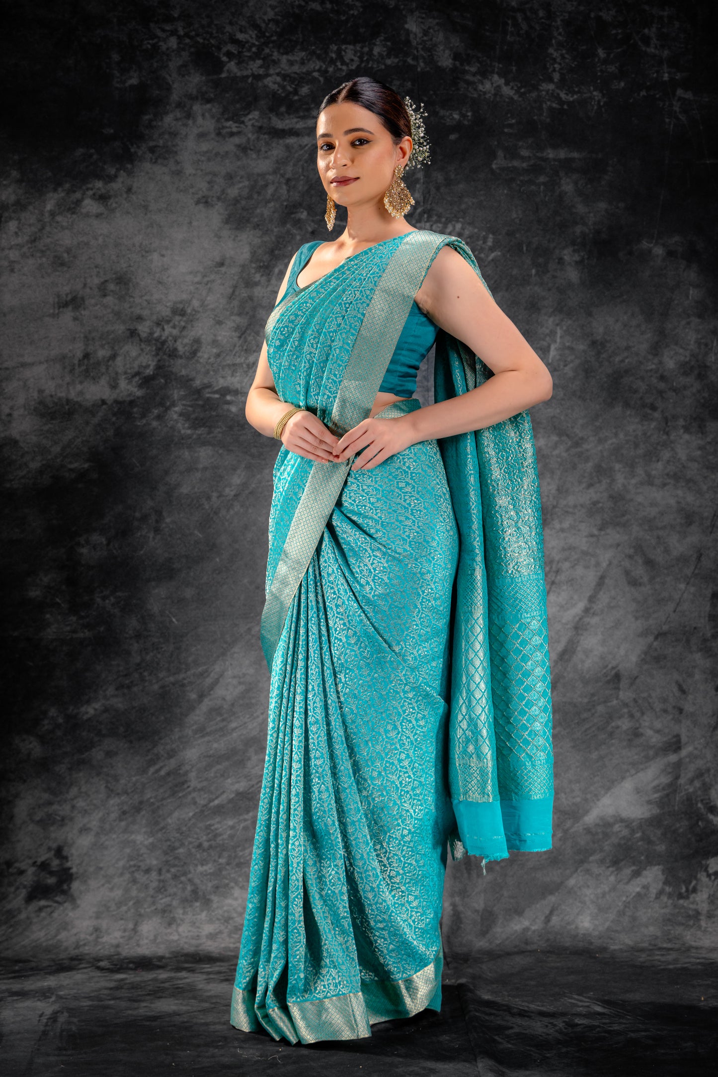 Sea Teal Zari Crepe Brocade Saree with Intricate Zari Floral Weave