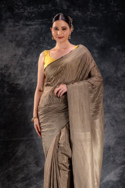 Mocha Beige Crepe Saree with Silver Zari Buttas and Elegant Striped Border