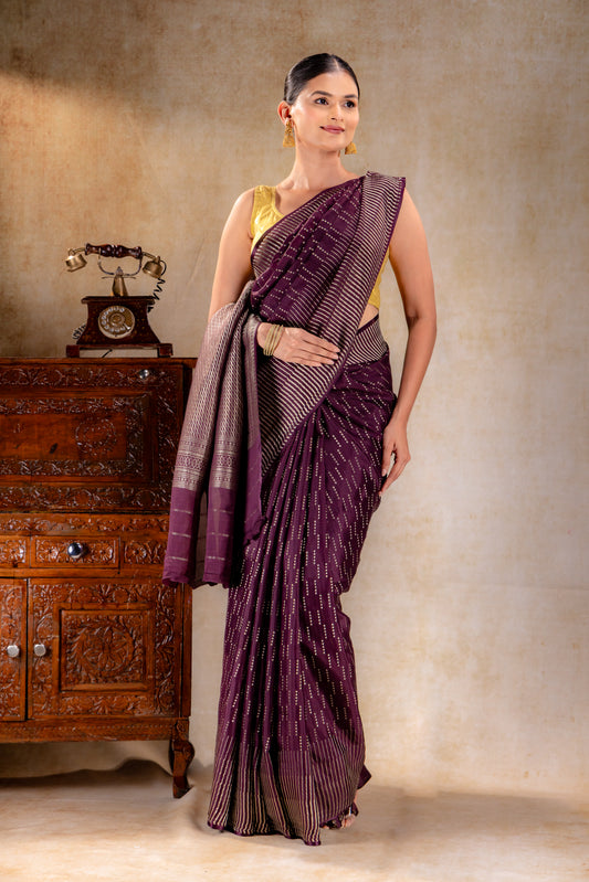 Plum Purple Crepe Saree with Vertical Zari Dots and Contemporary Striped Border