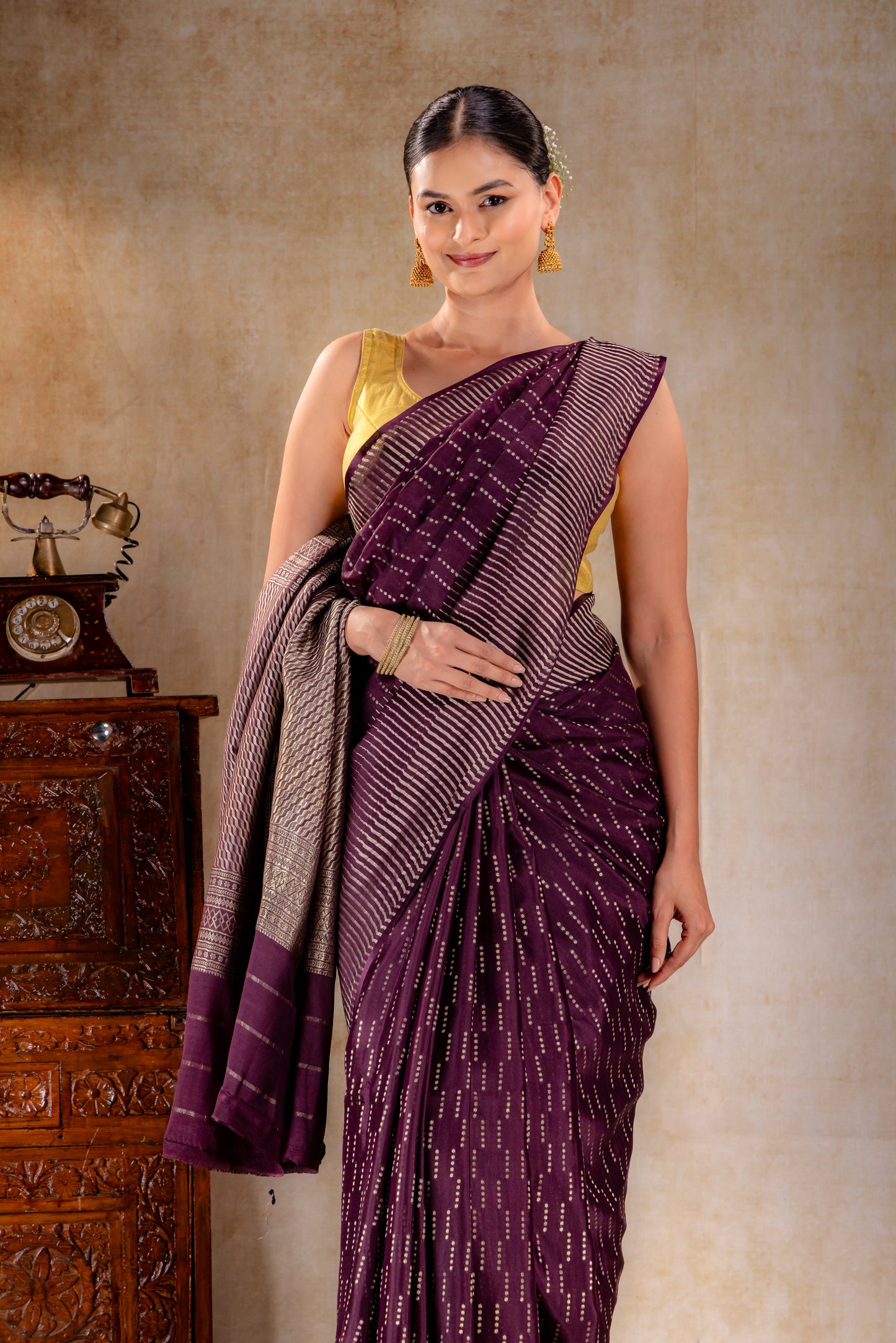 Plum Purple Crepe Saree with Vertical Zari Dots and Contemporary Striped Border