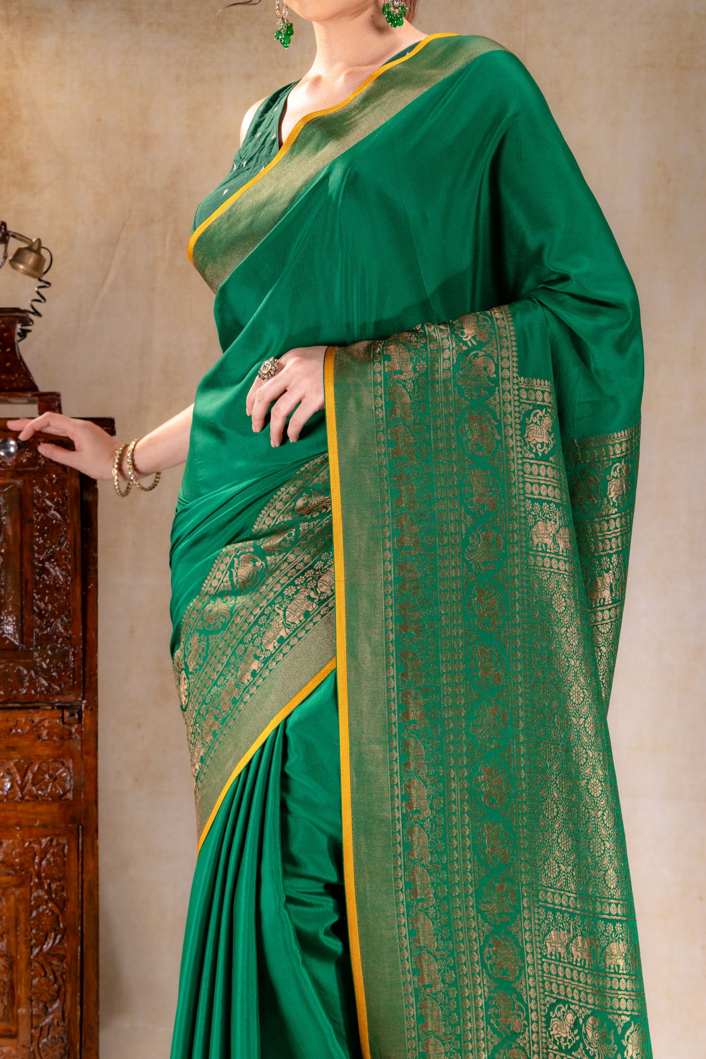 Emerald Green Crepe Silk Saree with Antique Elephant Zari Border