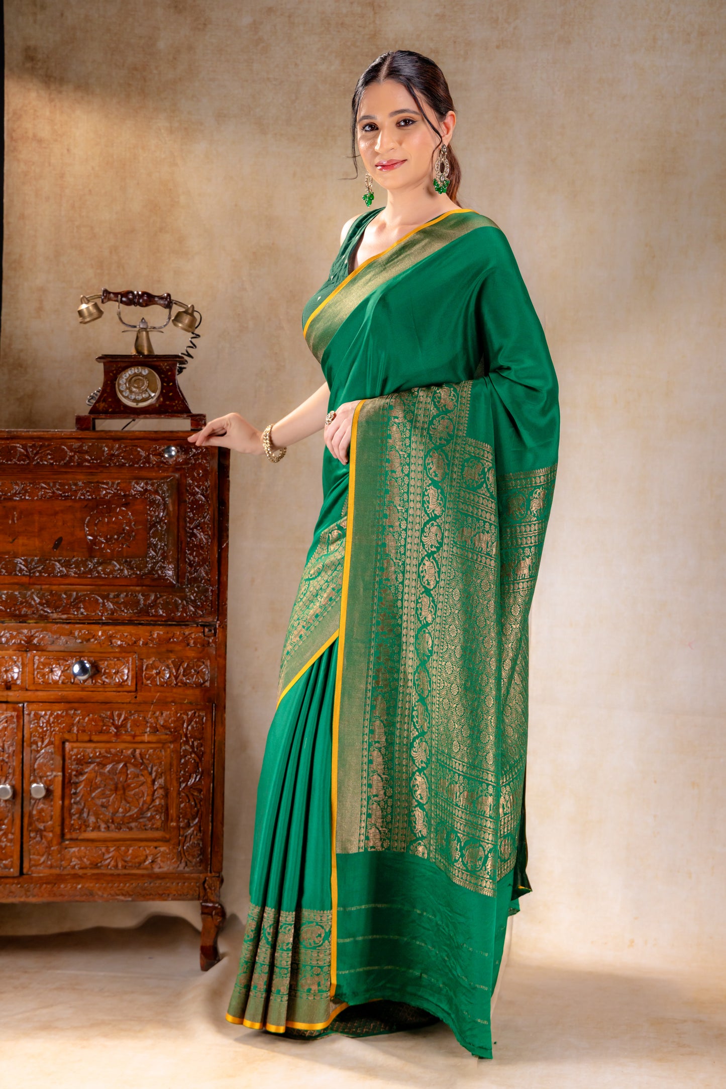 Emerald Green Crepe Silk Saree with Antique Elephant Zari Border