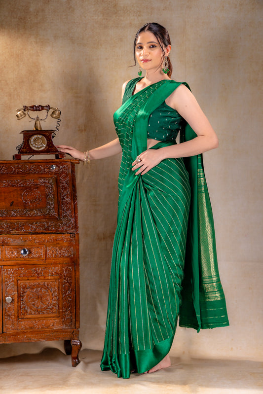 Emerald Green Crepe Saree with Gold and Silver Zari Stripe Detailing