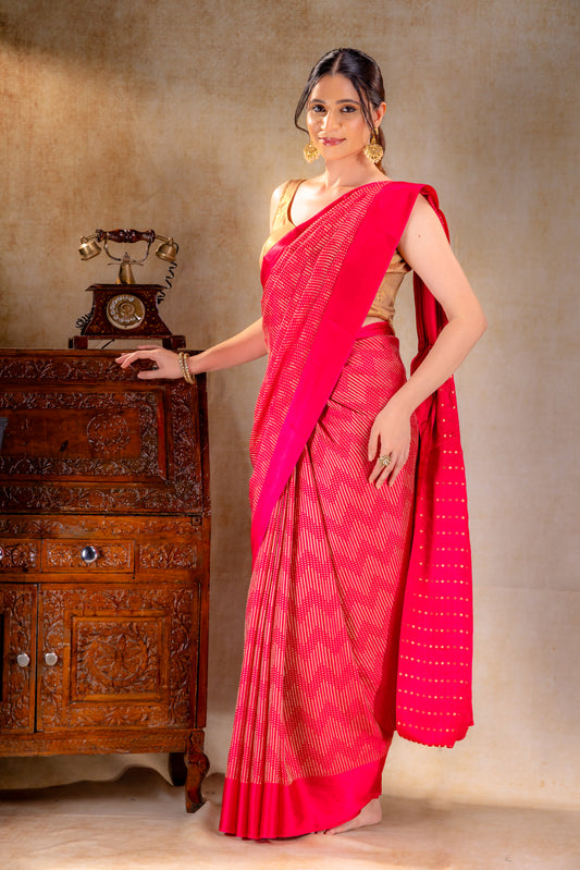 Rani Pink Crepe Silk Saree with Metallic ZigZag Weave and Satin Border