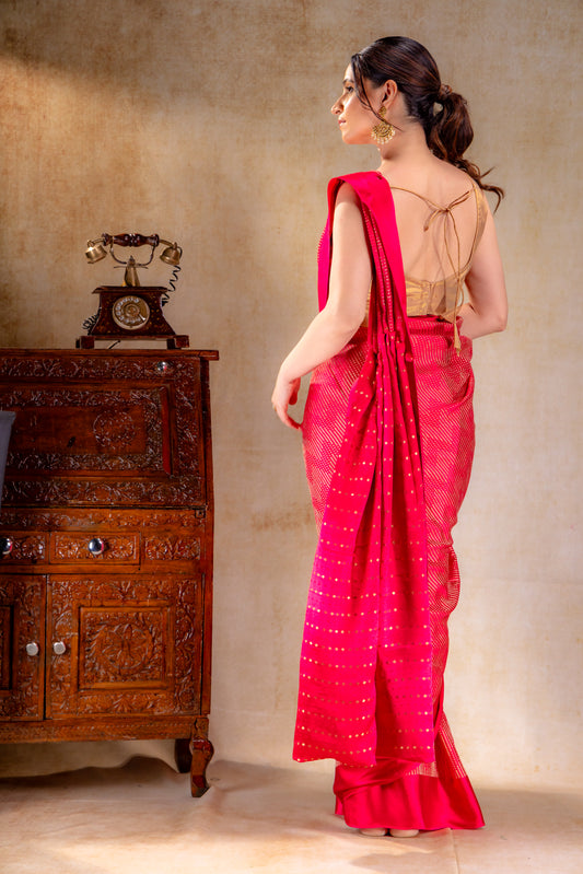 Rani Pink Crepe Silk Saree with Metallic ZigZag Weave and Satin Border