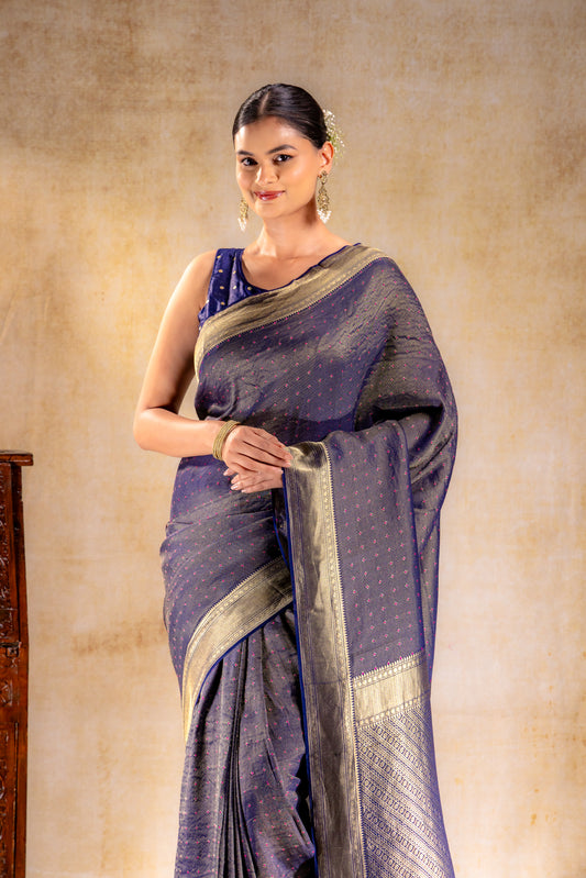 Royal Indigo Crepe Silk Saree with Rani Meena Buttas and Diagonal Zari Weave