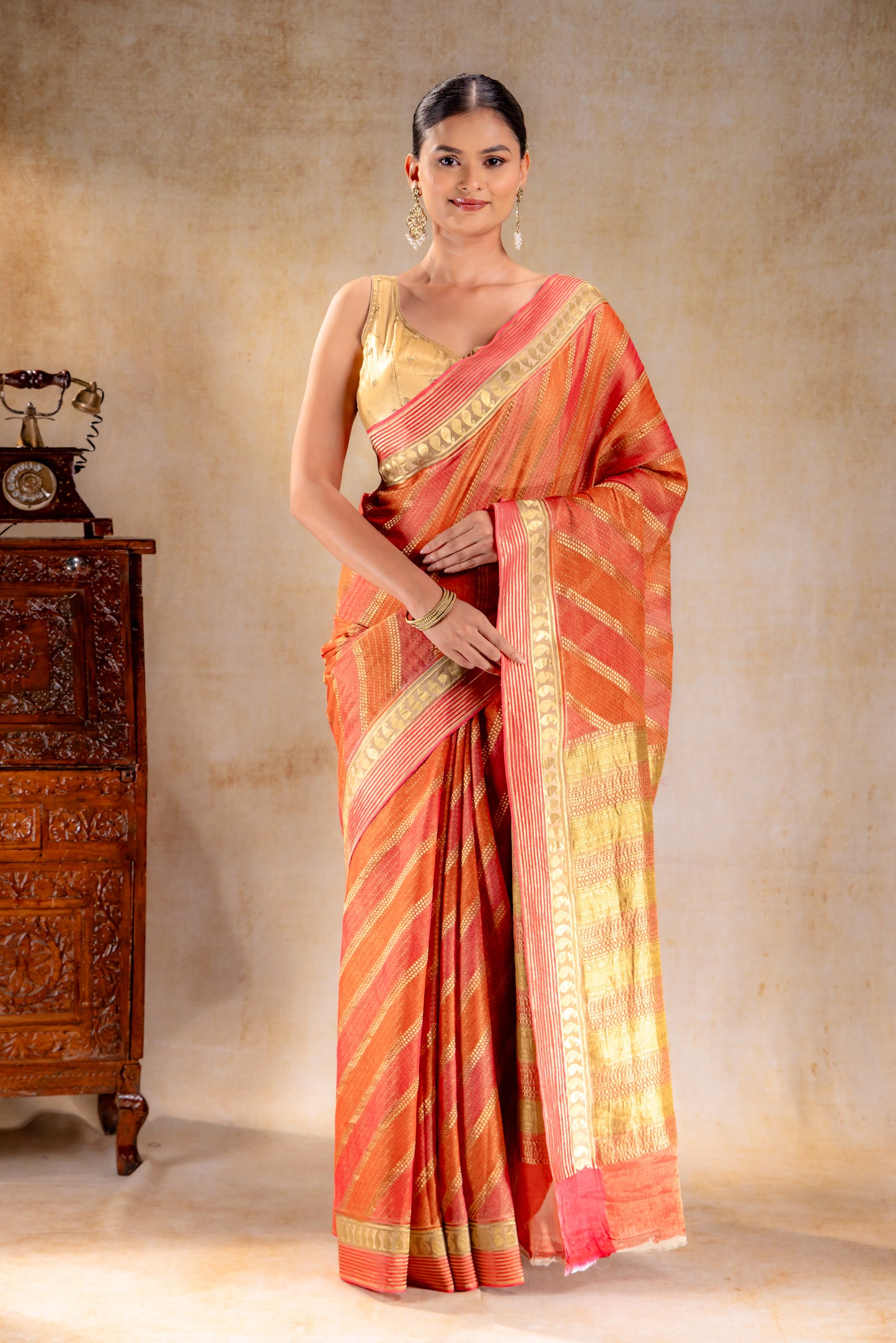 Rust Orange Tissue Saree with Diagonal Zari and Mango Border