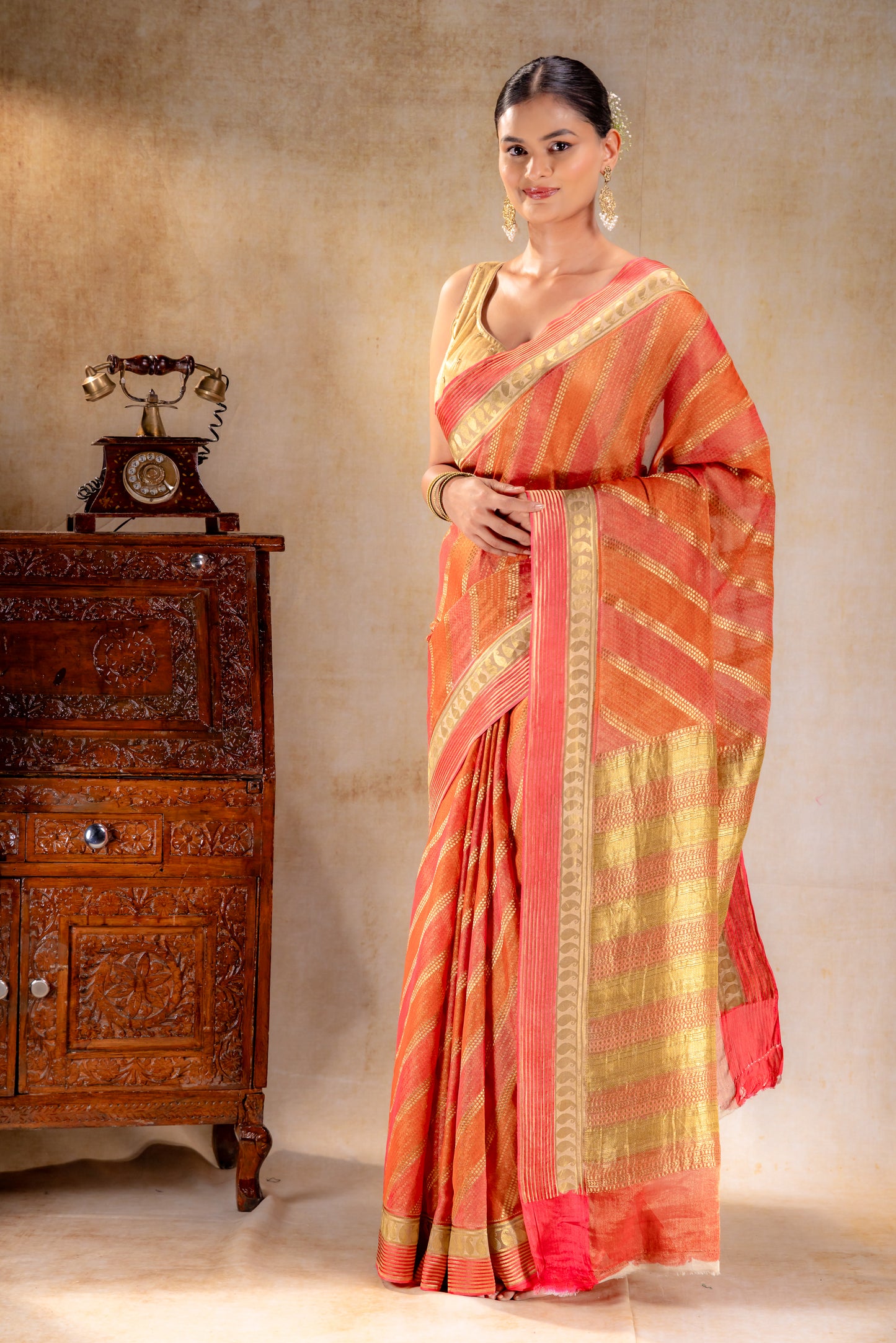 Rust Orange Tissue Saree with Diagonal Zari and Mango Border