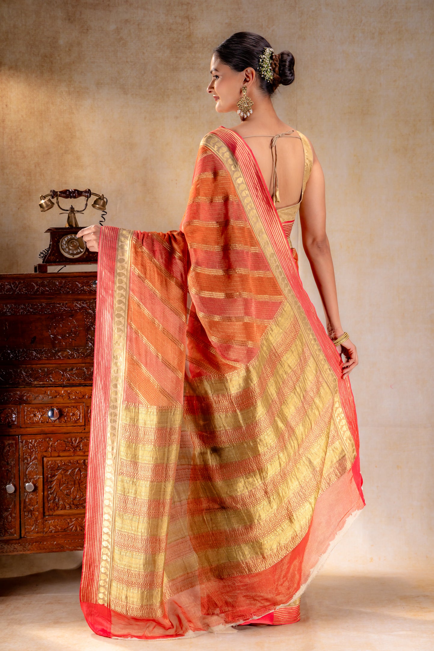 Rust Orange Tissue Saree with Diagonal Zari and Mango Border
