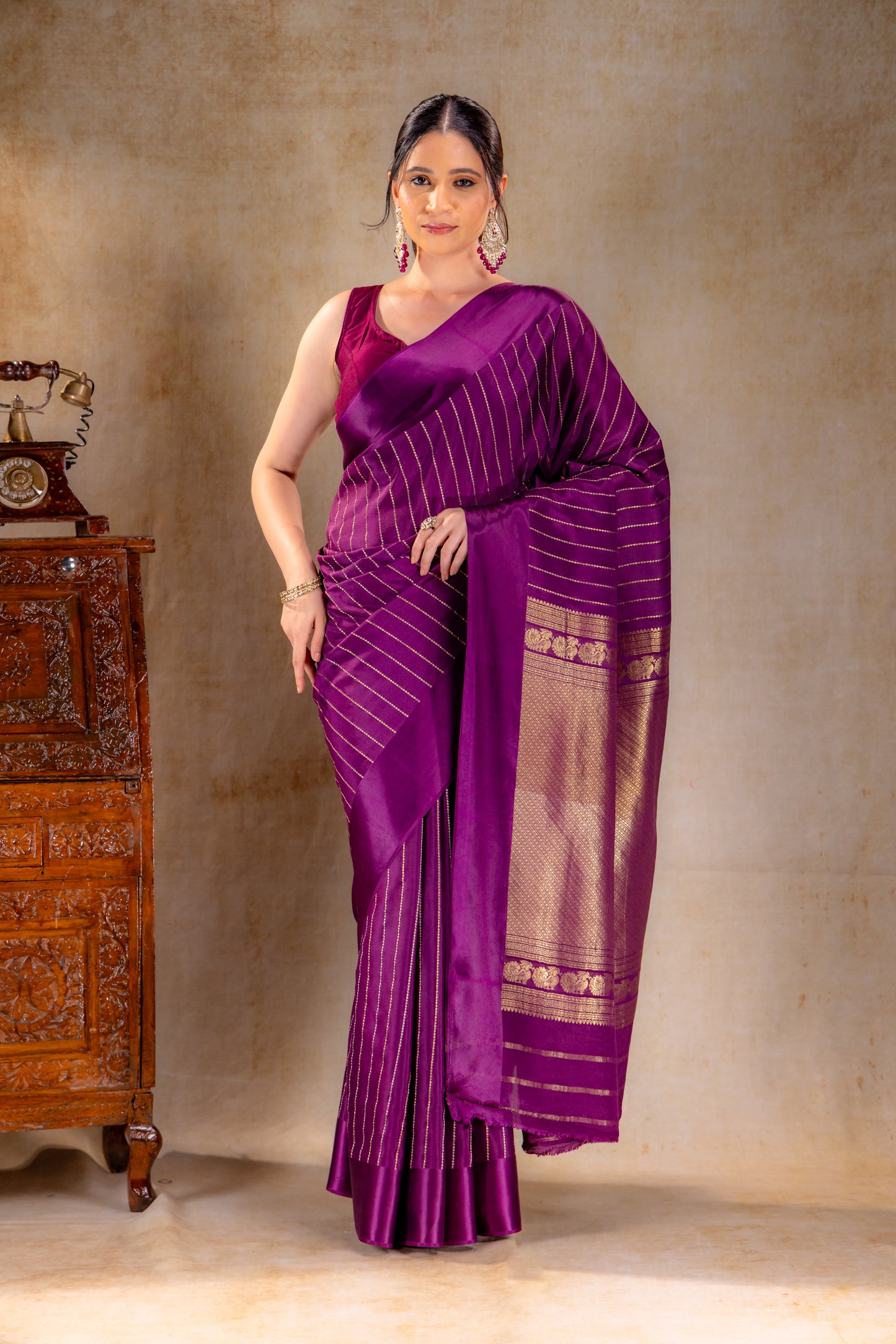 Royal Plum Crepe Saree with Gold and Silver Zari Stripe Detailing