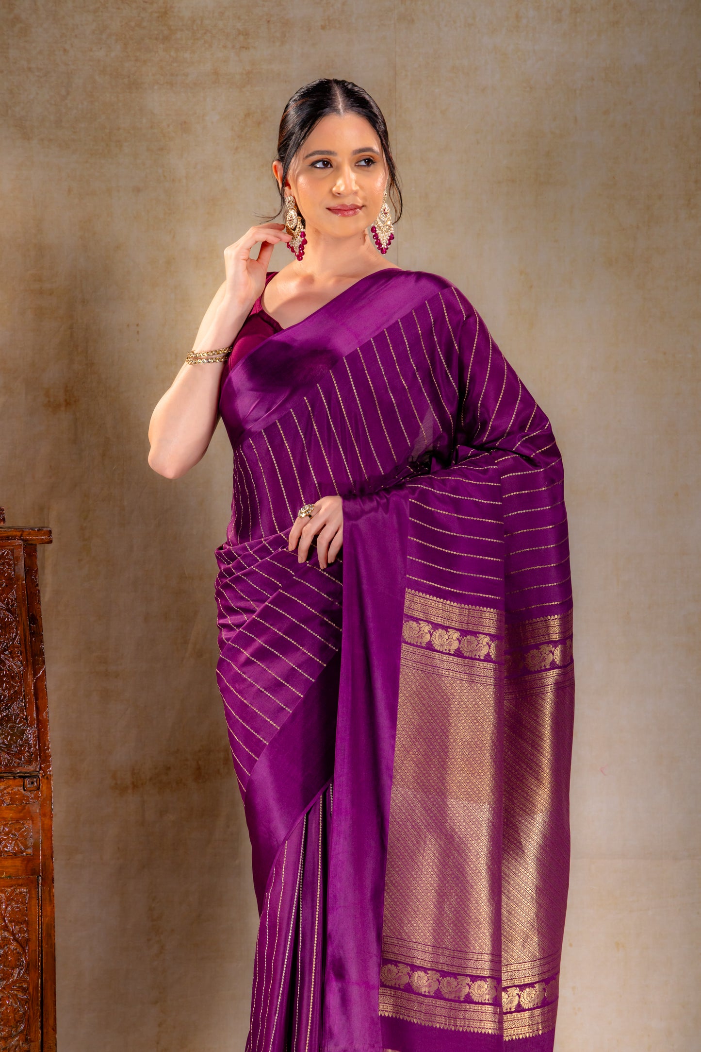 Royal Plum Crepe Saree with Gold and Silver Zari Stripe Detailing