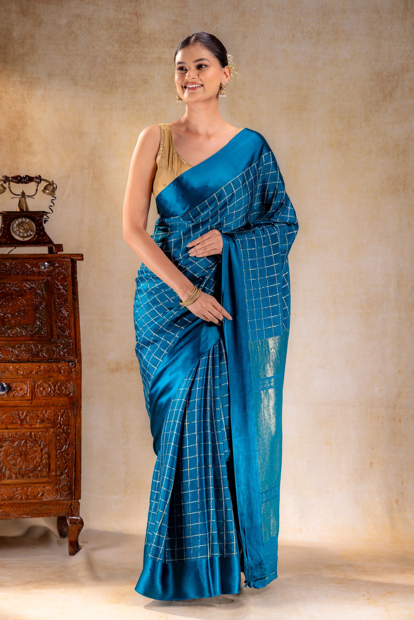 Peacock Teal Crepe Saree with Gold-Silver Check Lines with Satin Border