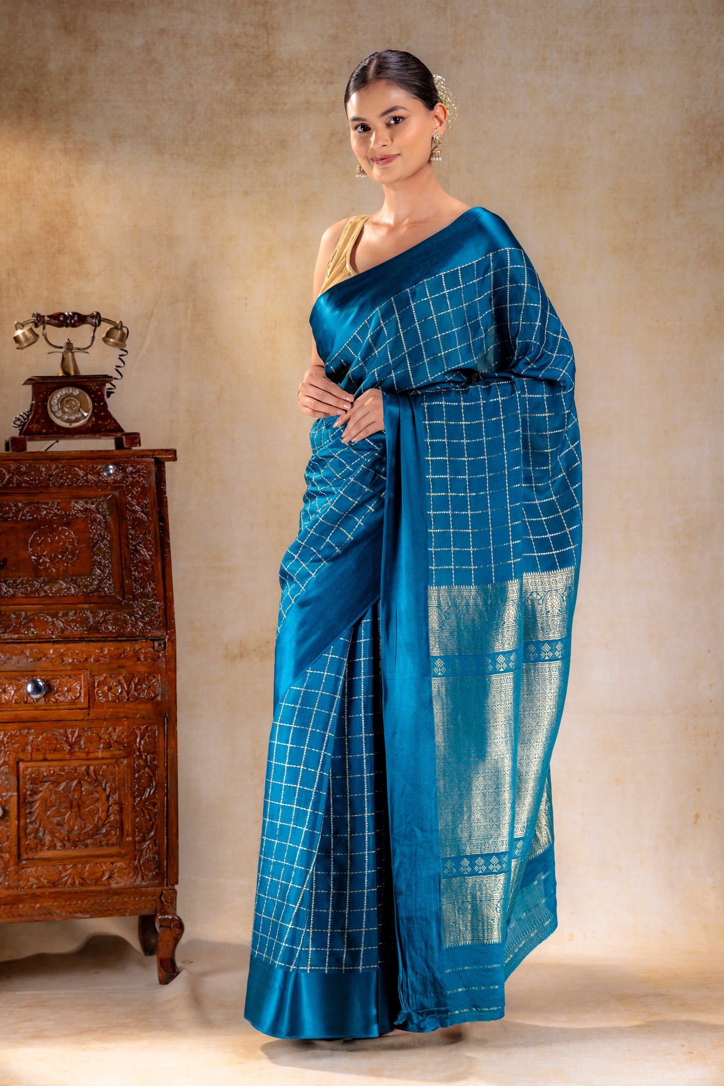 Peacock Teal Crepe Saree with Gold-Silver Check Lines with Satin Border