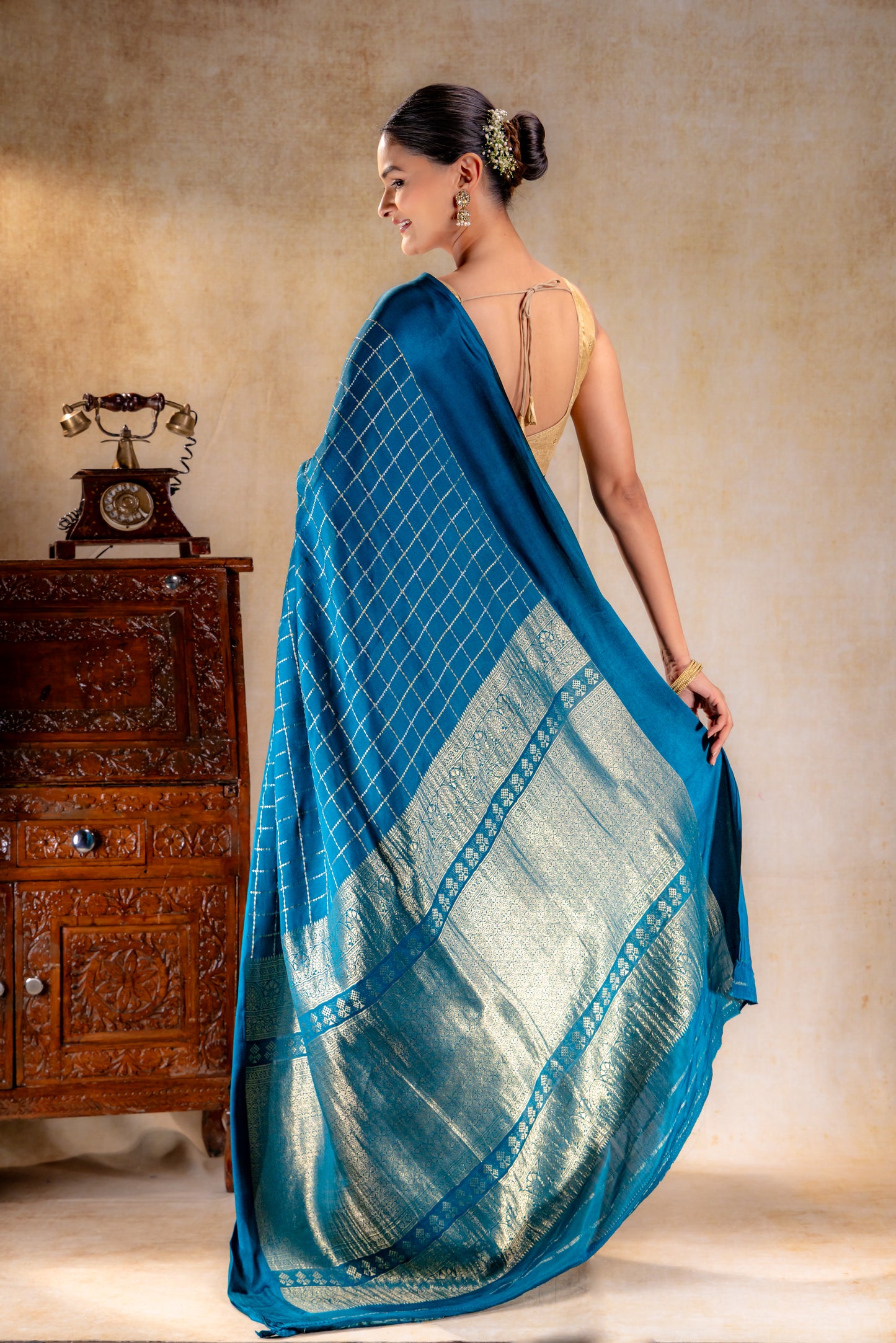 Peacock Teal Crepe Saree with Gold-Silver Check Lines with Satin Border