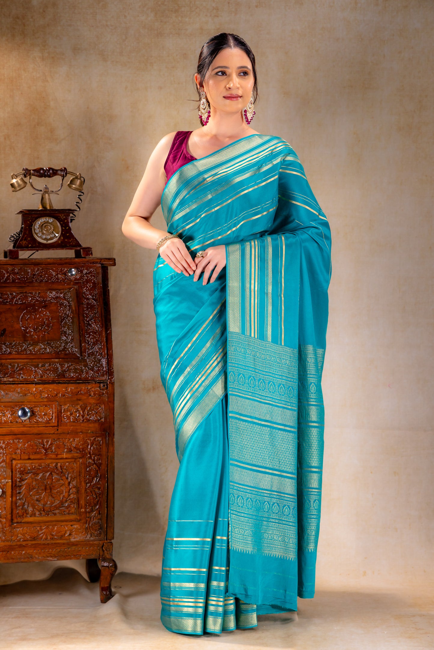 Teal Blue Crepe Saree Gold Zari Rich Border