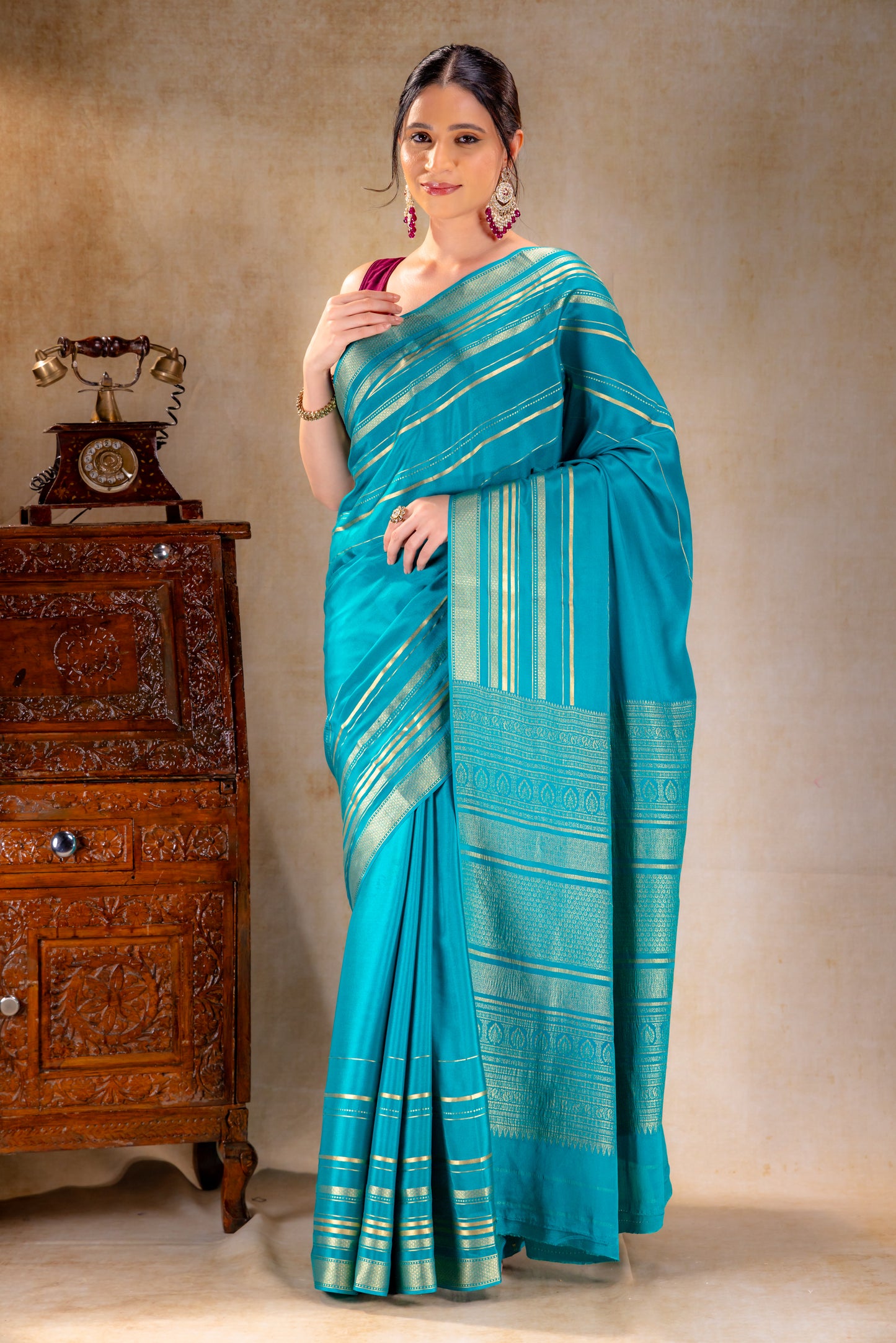 Teal Blue Crepe Saree Gold Zari Rich Border
