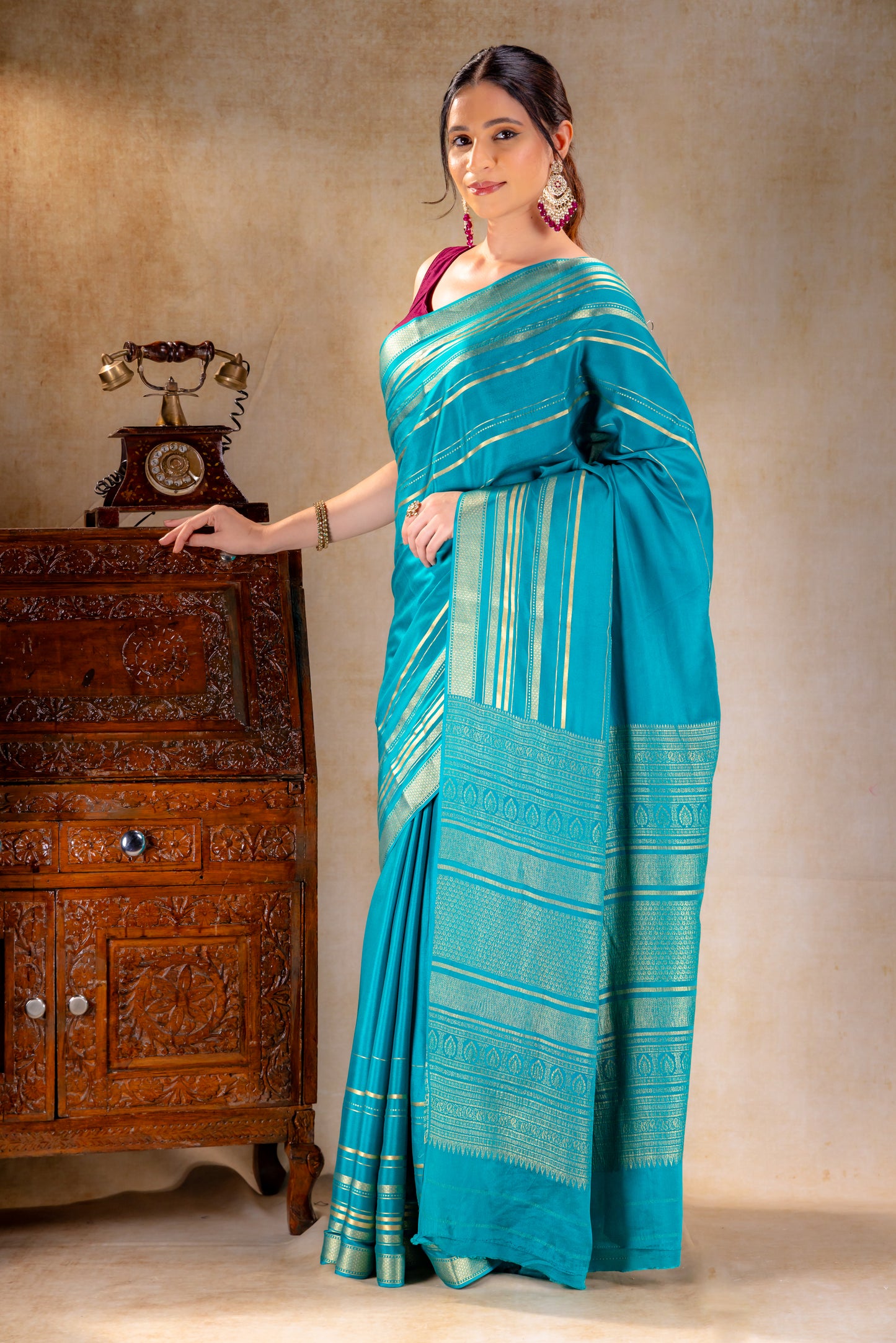 Teal Blue Crepe Saree Gold Zari Rich Border