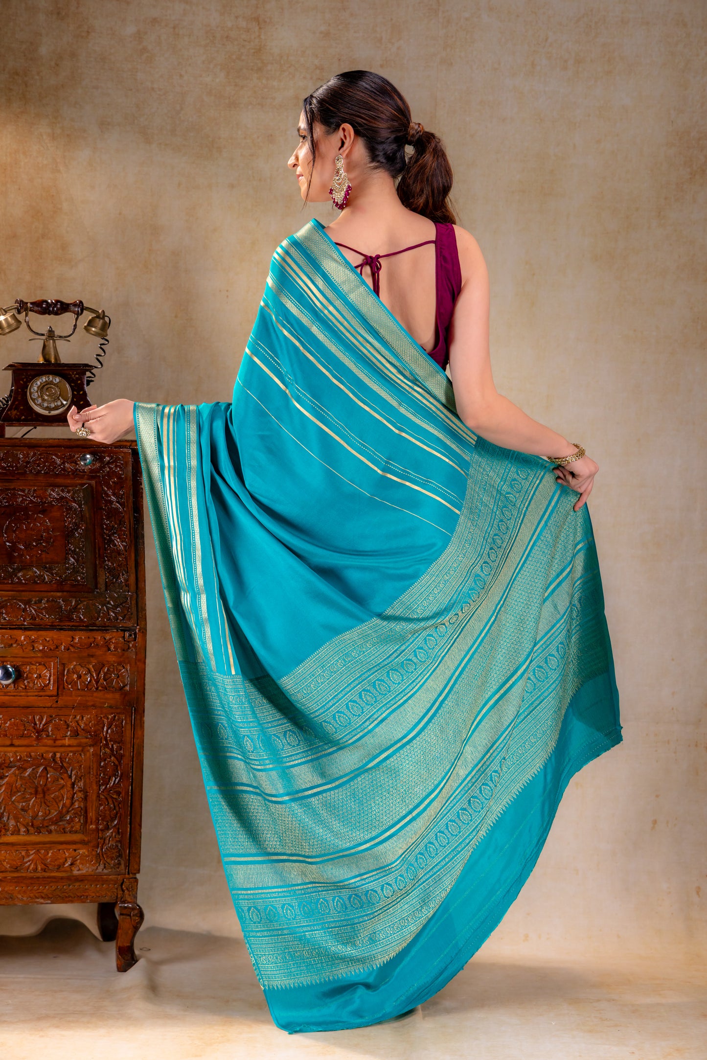 Teal Blue Crepe Saree Gold Zari Rich Border