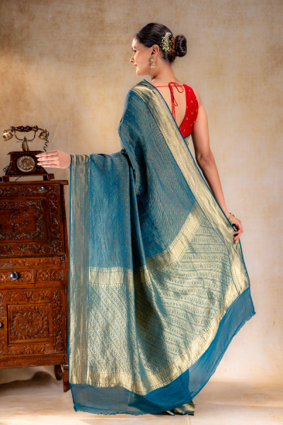 Peacock Teal Crepe Silk Saree with Rani Meena Buttas and Diagonal Zari Weave