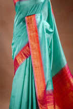 Gadwal Silk Aqua Blue with Pink Border Saree that-saree-shop.myshopify.com