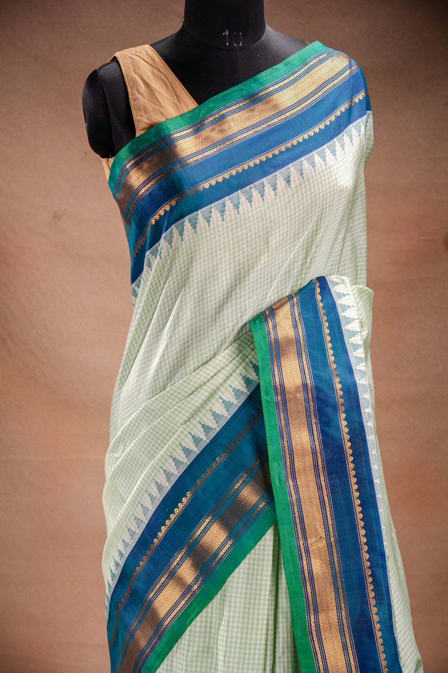Gadwal Silk Light Green Checks with Blue Border Saree