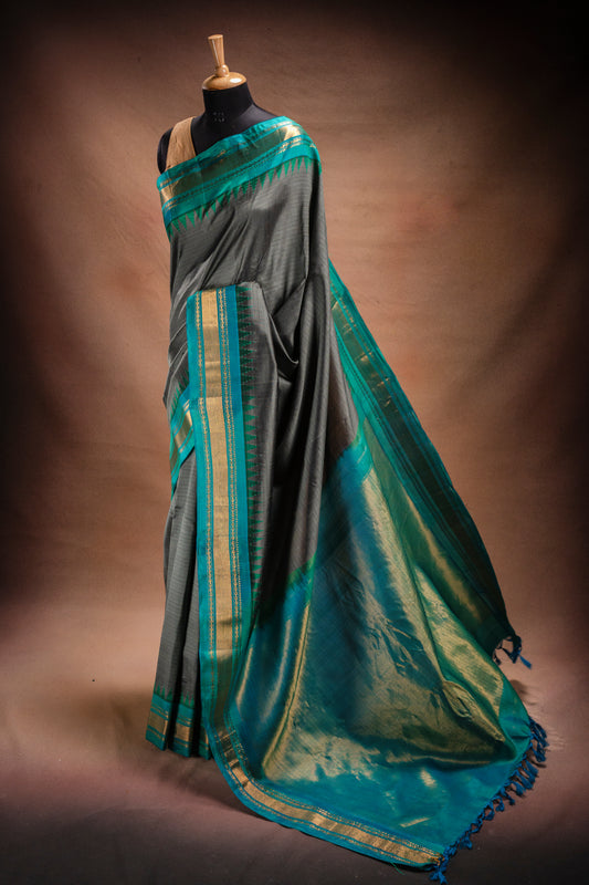 Gadwal Silk Grey with Teal Border Saree