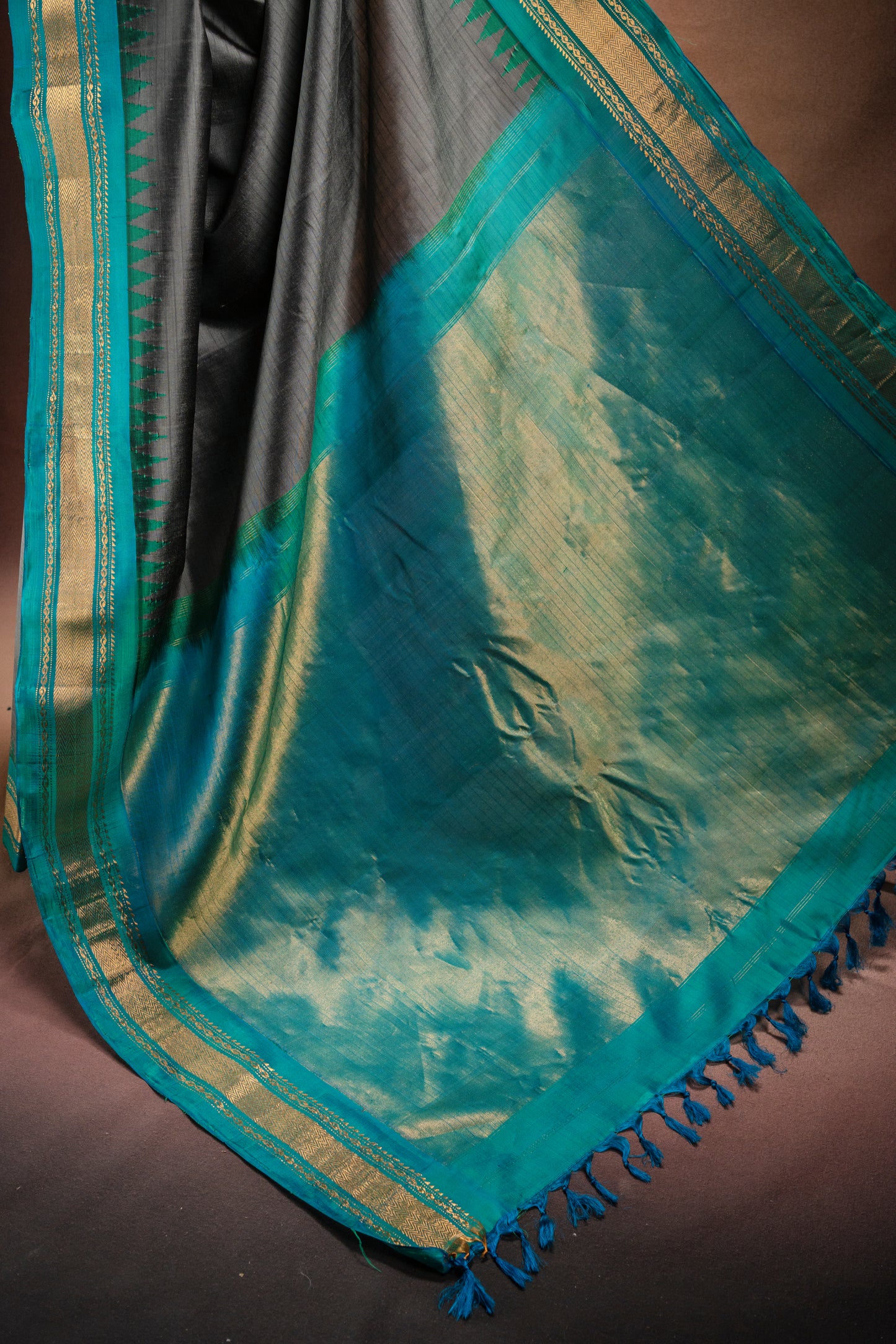 Gadwal Silk Grey with Teal Border Saree