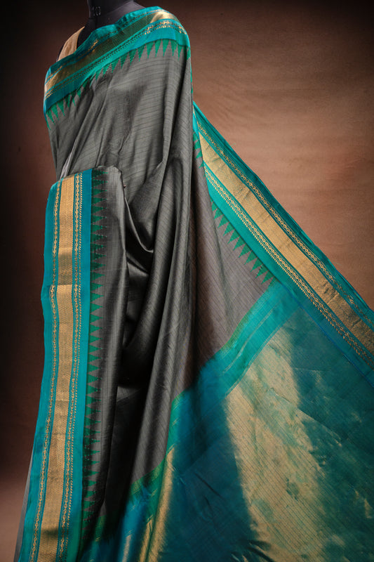 Gadwal Silk Grey with Teal Border Saree