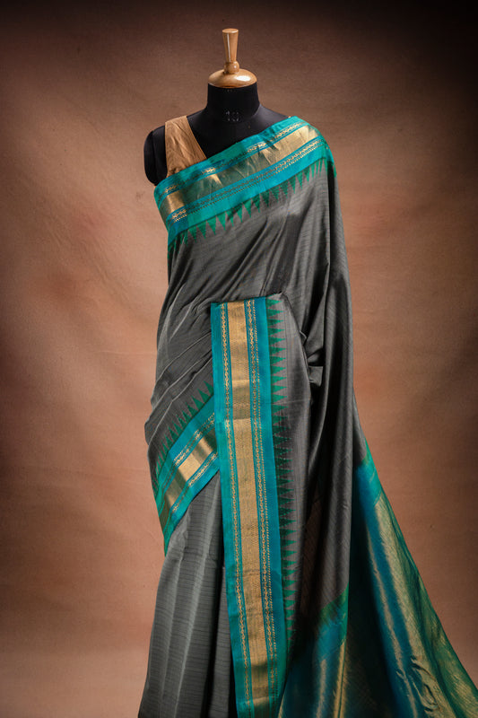Gadwal Silk Grey with Teal Border Saree