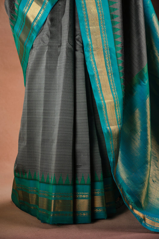 Gadwal Silk Grey with Teal Border Saree