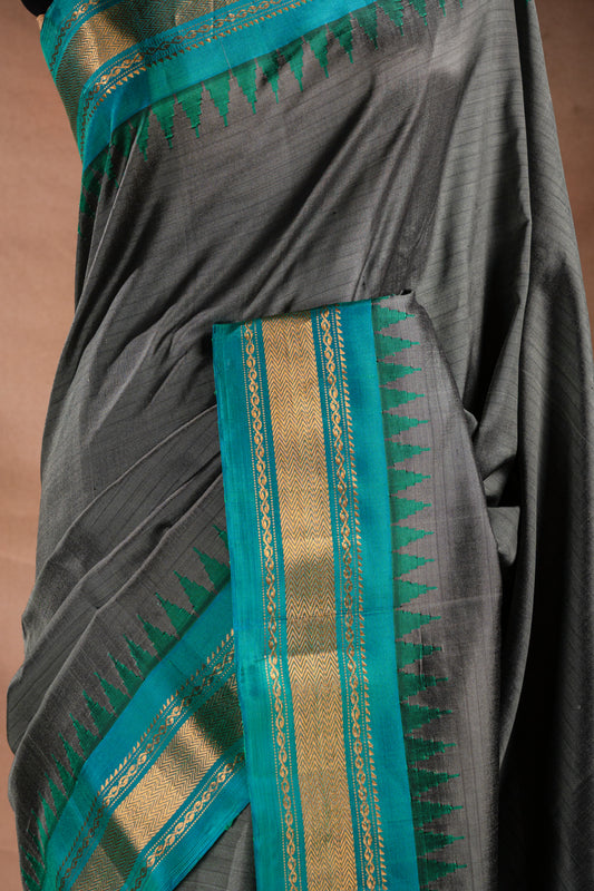 Gadwal Silk Grey with Teal Border Saree