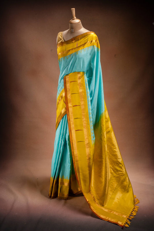 Gadwal Silk Sky Blue with Mustard Border Saree