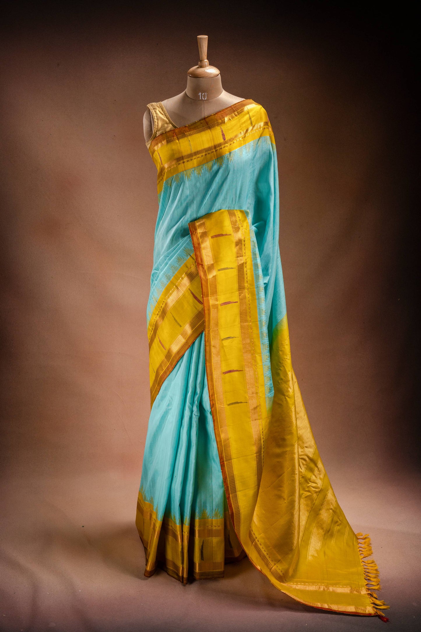 Gadwal Silk Sky Blue with Mustard Border Saree
