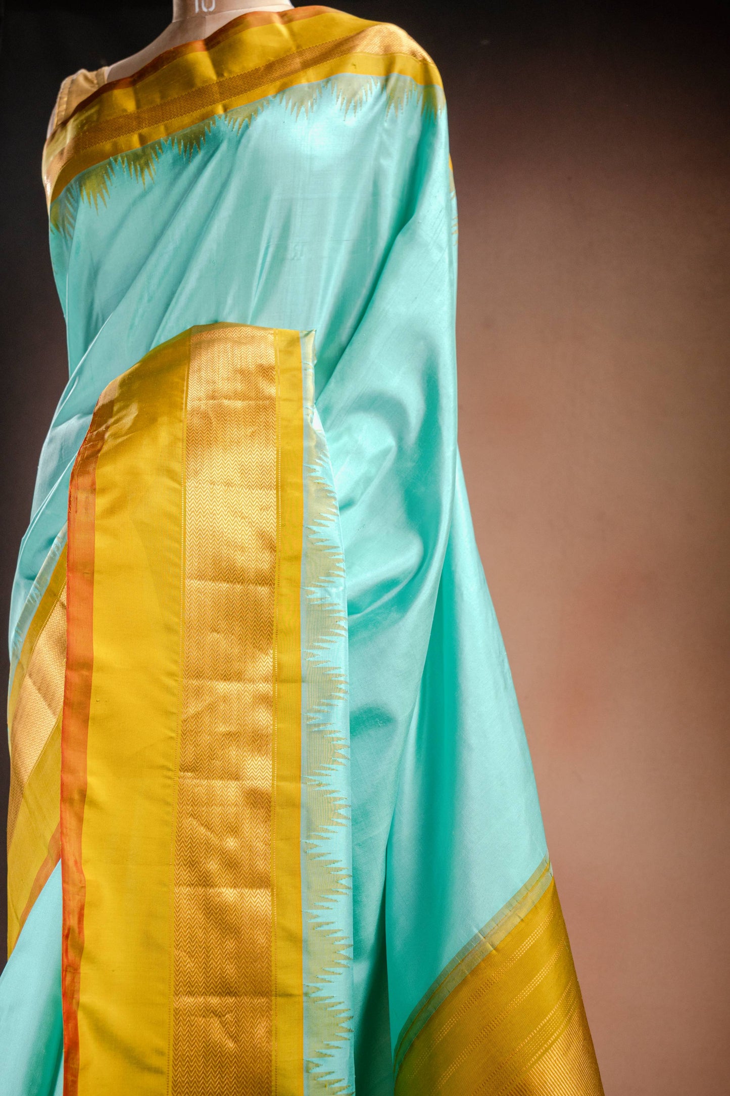 Gadwal Silk Aqua Blue with Mustard Border Saree