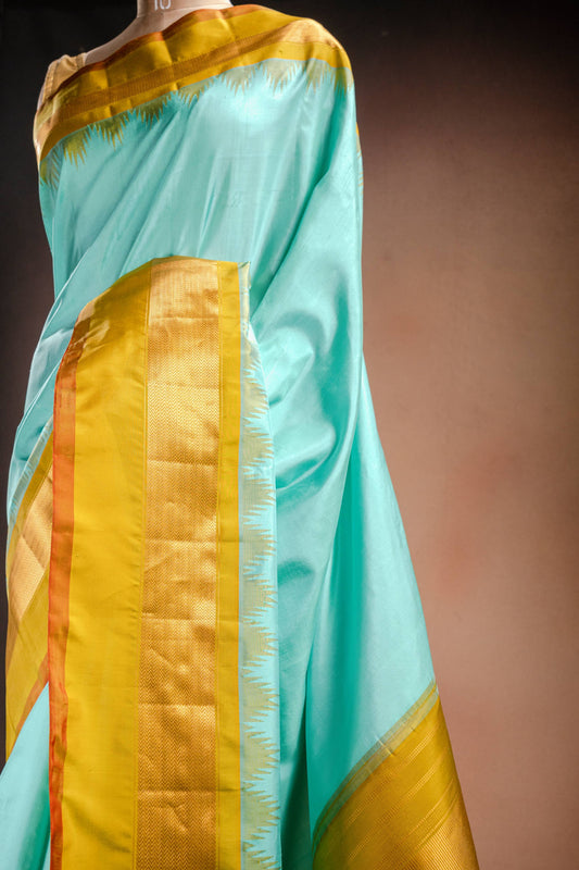 Gadwal Silk Aqua Blue with Mustard Border Saree