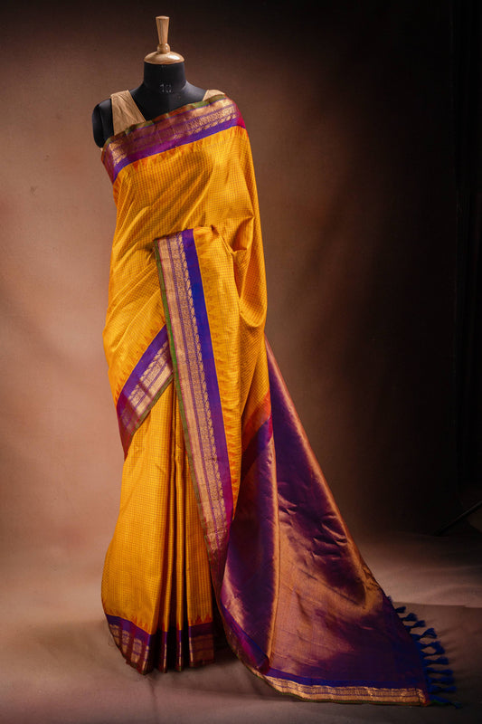 Gadwal Silk Yellow with Purple Border Saree